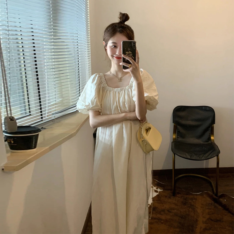 高级感白色连衣裙女夏2024新款温柔风圆领法式泡泡袖宽松显瘦长裙